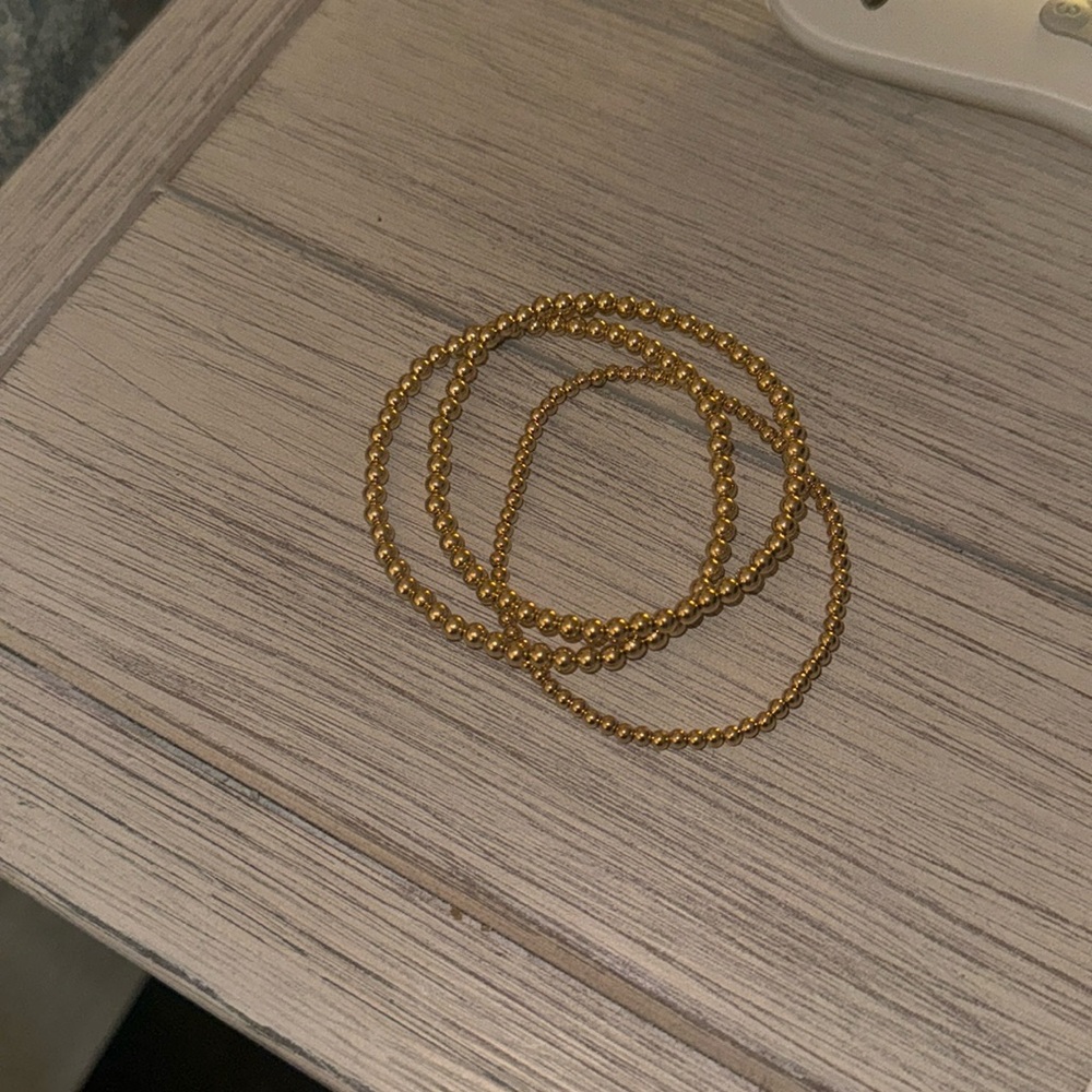 Kylar Mack gold bracelet stack